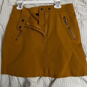 gold/yellow mini skirt